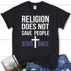 Christian T Shirts Religion Does Not Save People Jesus Does T Shirt, Blessed T Shirt, Bible T shirt, T shirt Women Welcome to our world where Christian T shirts are not just apparel, but also symbols of faith and love. Each shirt is created with passion and creativity, making it a great way to share and express your faith. With profound designs and spiritual messages, we offer you more than just a shirt, but an opportunity to renew and enrich your spiritual journey. Product Details: - Material: 100% cotton for ultimate comfort. - Model: The Gildan 5000, a timeless choice for your wardrobe. - Fabric: Classic midweight material that is preshrunk, providing a comfortable and consistent fit. - Design: Featuring double-needle sleeve and bottom hems, along with a seamless double-needle 7/8″ - co Christian Wishes, Bible Message, Christian Tshirts Women, Christian Illustration, Jesus Clothes, Christian Hats, Christian Shirts Designs, Christian Board, Bible Verses About Faith