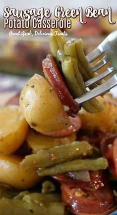 a fork with some food on it and the words sausage beef, potato casserole