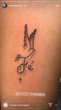 a small tattoo on the back of a woman's leg that reads, fire