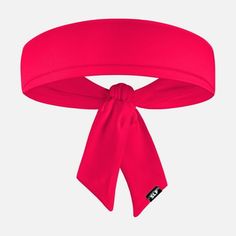 a bright pink headband with a knot on the front and side, tied up