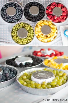 several tins filled with different types of fruit