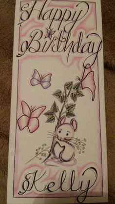 a birthday card with an image of a mouse holding a flower and butterflies on it