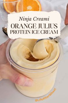 an orange juice is being poured into a jar with the words, ning cream orange jujus protein ice cream