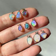 "14K Yellow gold, 14K Rose gold  or Sterling silver pendant with Australian Opals Metal: 14K yellow gold (a, b, c,); 14K Rose gold (d, e, f); Sterling silver (g, h, i) Opal sizes: a - 8×6.5mm, b - 8x6mm, c - 6x5mm, d - 6.5×4.5mm, e - 6x5mm, f - 7×5.5mm, g - 8.4�×5.4mm, h - 9x7mm, i - 6.5×6.2mm Chain: 14K Yellow gold and Rose gold 0.8mm cable, Sterling silver 1mm cable Length: 16\" Natural untreated stones. Not man made. Not lab created." Iridescent Opal Pendant Jewelry, Opal Jewellery, Polished Opal Pendant Jewelry, Solid Opal Ring, London Blue Topaz Necklace, Necklace Gift Box, Blue Opal Ring, Boulder Opal Pendant, Unique Opal