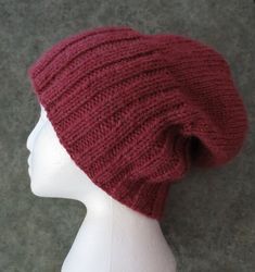 This hat is so soft, warm and cozy.  The ribbed band is extra long and folds up to cover the ears with double thickness for extra warmth.  Fold it up a lot for no slouch, a little for some slouch or unfold completely for full slouch. Small-Medium size measures 12" long (including ribbing) and 19.5" around.  The ribbing measures 5.5" long and 7" wide when laid flat and not stretched.  Fits most heads up to 24". Large size measures 12.5" long (including ribbing) and 22" around.  The ribbing measur Knit Alpaca, Slouchy Hat, Heads Up, Folded Up, Extra Long, Warm And Cozy, Alpaca, Hand Knitting, Large Size