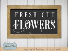 a black and white sign that says fresh cut flowers