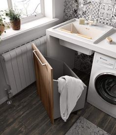 a washer and dryer in a small room