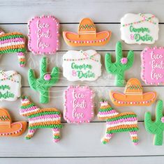 decorated cookies are arranged in the shape of sombrero, cactus, and taco hats