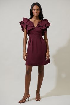 Make your day date extra cute with the Wilma Ruffle Mini Dress! Layered ruffles on the shoulders are followed by a split neckline. The smocked waistband and back tie make it easier to get in and out. Pair it with strappy heels and a wide sun hat for an effortless summer look.- Ruffles- Split neck- Pockets- Smocked- Comes in 4 colorsSize + Fit - Model is 5'8" and wearing size XS- Measurements taken from size S - Chest: 17 3/4"- Length: 35 1/2" Fabric Self:100%Cotton Style Number STD14197SDR Mini Ruffle Dress, Dress Layered, Ruffle Mini Dress, Shopping Day, Floral Ruffle, Summer Look, Red Mini Dress, Sun Hat, Strappy Heels