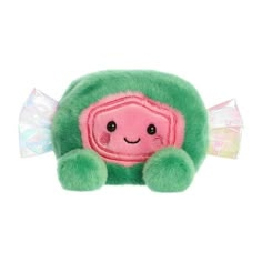 a green stuffed animal with a pink face