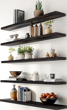 some shelves with vases and bowls on them