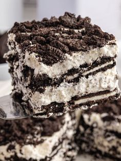 a close up of a piece of cake on a plate with a fork in it