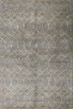 an area rug with circles in grey and gold