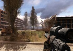 an image of a video game being played on the computer screen with trees and buildings in the background