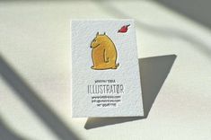 a business card with an image of a bear on it