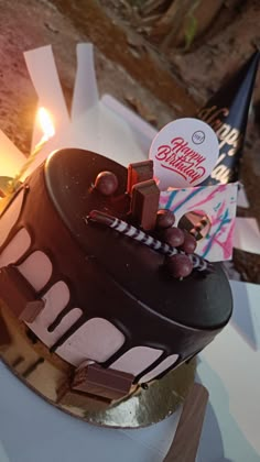 a chocolate cake sitting on top of a table