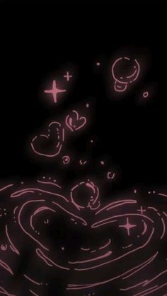 an image of a heart in the air with stars and planets around it on a black background