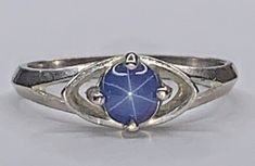 Vintage Trubrite 10K White Gold 5mm Blue Star Sapphire Eye Iris Ring SZ 5.75 | eBay Blue Star Ring, Antique Sapphire Ring, Eye Iris, Saturn Ring, Iris Ring, Sapphire Antique Ring, Sapphire Eyes, Blue Star Sapphire, Star Sapphire