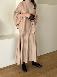 ▶ Colors ◀ Beige Black ▶ Size ◀ One size(Free) ▶ Fabric ◀ Acrylic ▶Size Spec◀ * Sweater * Total Length : 63cm Chest : 60cm(Around 120cm as circular) * Skirt * Total Length : 89cm Chest : 33cm(Elastic banding - Around 66cm as circular) -------------------------------------------- ▶ SHIPPING Information ◀ Delivery usually takes 10~15 business days. (Korea Post EMS) Even it is express shipping, recently it is not easy to get air space flexibly. Please, kindly wait a bit and be patient for us. *Deli Elegant Beige Knit Skirt, Elegant Knit Relaxed Skirt, Elegant Relaxed Knit Skirt, Chic Long Knit Skirt, Winter Long Pleated Dress, Winter Dress With Long Pleated Skirt, Flowy Long Sleeve Dress For Winter, Beige Maxi Skirt For Fall, Chic Knit Skirt For Fall