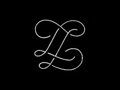 the letter l is drawn in white ink on a black background, and it appears to be handwritten