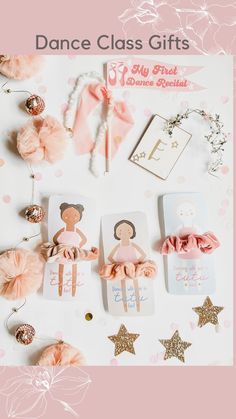 the dance class gifts are laid out on a white surface with pink and gold decorations