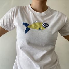 fish tee 🐠
Size M 
All shirts are unique and the fabric might slightly vary 
(Price is firm) 

Message me for custom orders!! 

#embroidery #patchwork #handmade Fun Patches, Embroidery Patchwork, Interview Outfit, Airport Outfit, Minimalist Outfit, School Outfit, Love And Care, Festival Outfit, Concert Outfit