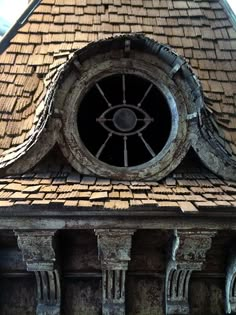 an eye is seen in the center of this building's round window and roof