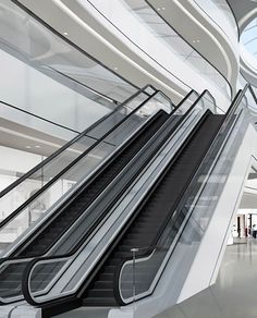 an escalator in the middle of a building