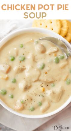 a bowl of chicken pot pie soup with crackers on the side and text overlay