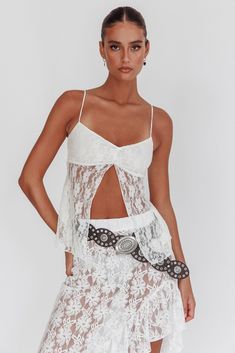 White Lace Camisole With Spaghetti Straps, Chic Summer Lace Top With Built-in Bra, Chic Lace Tops With Spaghetti Straps, Flirty Lace Trim Camisole For Summer, Chic Spaghetti Straps Top With Delicate Lace, Chic Spaghetti Strap Lace Top With Delicate Lace, White Lace Top With Spaghetti Straps And Lace Trim, White Lace Top With Lace Trim And Spaghetti Straps, Chic Delicate Lace Top With Spaghetti Straps