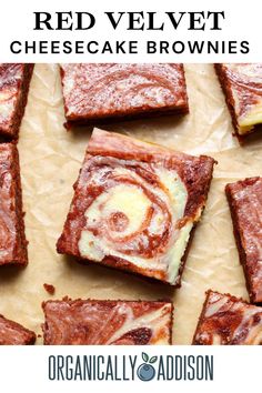 red velvet cheesecake brownies on parchment paper with text overlay that reads, red velvet cheesecake brownies