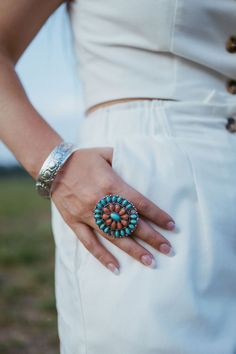 Large Turquoise and Coral Cluster Adjustable Ring! We have the perfect earrings and necklace to pair with it! Nickel Free Bohemian Ring, Southwestern Style Turquoise Ring, Nickel Free Multicolor Ring, Nickel Free Multicolor Ring Jewelry, Bohemian Blue Jewelry With Metal Ring, Blue Bohemian Jewelry With Metal Ring, Turquoise Multi-strand Jewelry For Festivals, Nickel-free Bohemian Style Ring, Nickel-free Multicolor Ring Jewelry