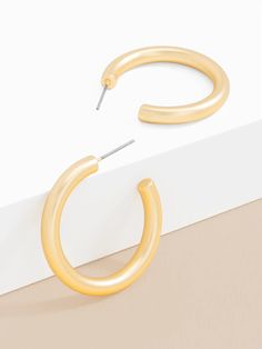 Lookin' for a little somethin' somethin'? Our Zenzii Chunky Hoop Earrings are exactly what you need! Crafted with 25mm brass-based c-hoops, triple-plated in hypoallergenic metal, and completed with a signature post back, these are perfect for any ear party you're throwing! (And they measure 1" across, so they won't get lost in the crowd.) Ear Party, Chunky Hoop Earrings, Earring Gold, Hot Mess, Chic Boutique, Holiday Specials, Matte Gold, Easy Wear, Phone Numbers