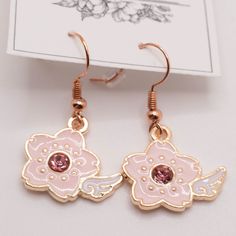 Handmade Earrings Style: Winged Sakura Earrings Comes With Organza Bag New Makes A Great Gift For Any Occasion Or Holiday! Don't Forget To Check Out My Other Styles! Keywords: Kawaii, Anime, Sakura, Winged, Present, Hanging, Earring, Drop, Birthday, Gift, Handmade, Made In Usa, Nj Artist, Female Owned, Artisan, Craft Feminine Rose Gold Earrings For Spring, Feminine Rose Gold Flower Earrings For Spring, Spring Rose Gold Dangle Jewelry, Pink Earrings With Ear Wire For Spring, Rose Gold Drop Earrings For Spring, Spring Rose Gold Drop Earrings, Rose Gold Flower Earrings For Spring, Pink Flower Charm Drop Earrings, Rose Gold Drop Flower Earrings For Spring