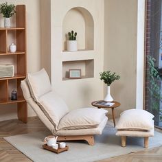 a living room scene with focus on the chaise lounge chair and footstool