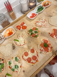 the pizzas are prepared and ready to be baked in the oven or on the counter