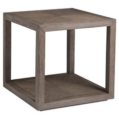 a square wooden table with an open shelf