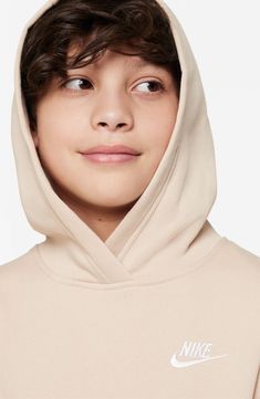 This quintessential, sporty hoodie is made from a cozy cotton blend and marked with an embroidered Futura logo, all in a scaled-down kids' size. Fixed hood Kangaroo pocket 80% cotton, 20% polyester Machine wash, tumble dry Imported Nike White Hoodie For Loungewear, White Nike Hoodie For Loungewear, Basic Cotton Hoodie With Adjustable Hood, Nike Cotton Hooded Sweatshirt, Nike Solid Color Hoodie With Drawstring, Nike Hoodie With Drawstring Hood For Fall, Nike Cotton Sweatshirt With Kangaroo Pocket, Nike Cotton Hoodie With Relaxed Fit, Nike Relaxed Fit Hooded Hoodie