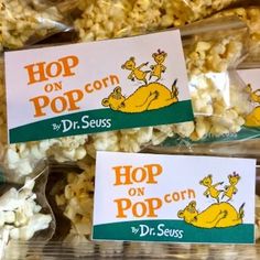 three bags of popcorn with dr seuss's logo on the front and back