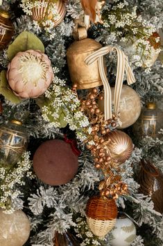 a decorated christmas tree with ornaments on it