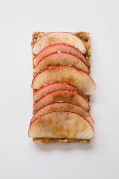 an apple slice on top of some bread