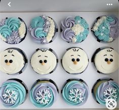 twelve frosted cupcakes in the shape of cartoon characters