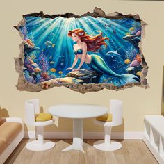 the little mermaid wall sticker is in an empty room