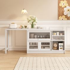 a white table with shelves and vases on it