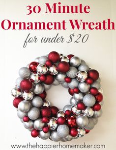 an ornament wreath for under $ 20 with red and silver ornaments on it