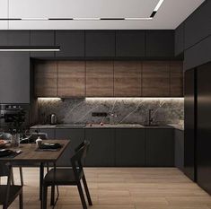 the kitchen is clean and ready to be used for dinner or lunchtime, with modern appliances