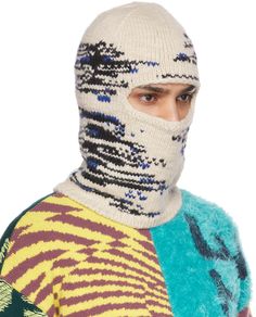 Knit wool balaclava in off-white featuring graphic pattern in black and blue. Part of the Stella McCartney x Ed Curtis collaboration. Made from cruelty-free materials. Face masks and face coverings are final sale and are not eligible for return or exchange. Supplier color: Natural Knitting Mask, Knit Balaclava, Knitted Balaclava, Face Coverings, Graphic Patterns, Natural Wool, Luxury Streetwear, Face Masks, Stella Mccartney