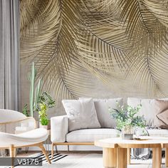 a living room filled with furniture next to a wall covered in palm leaf art pieces