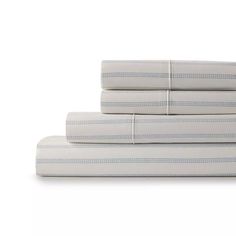 four white sheets stacked on top of each other in front of a white background with blue stripes