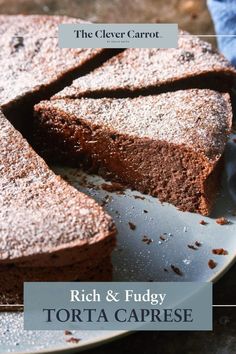 a chocolate cake on a plate with the words rich and fudgey torta caprese